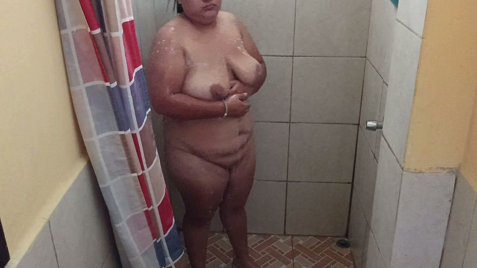Taking a shower in a public restroom.