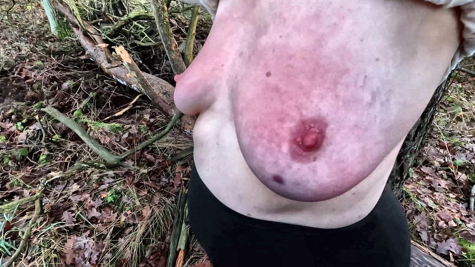 Walking and slapping her tits hard