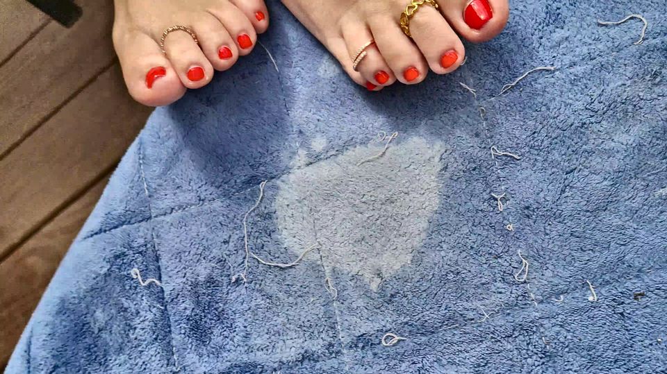 My neighbors cute red toes in the sun begging to be kissed and licked