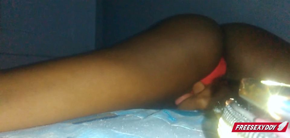Ebony, a young woman, orgasms so hard that the camera falls over.