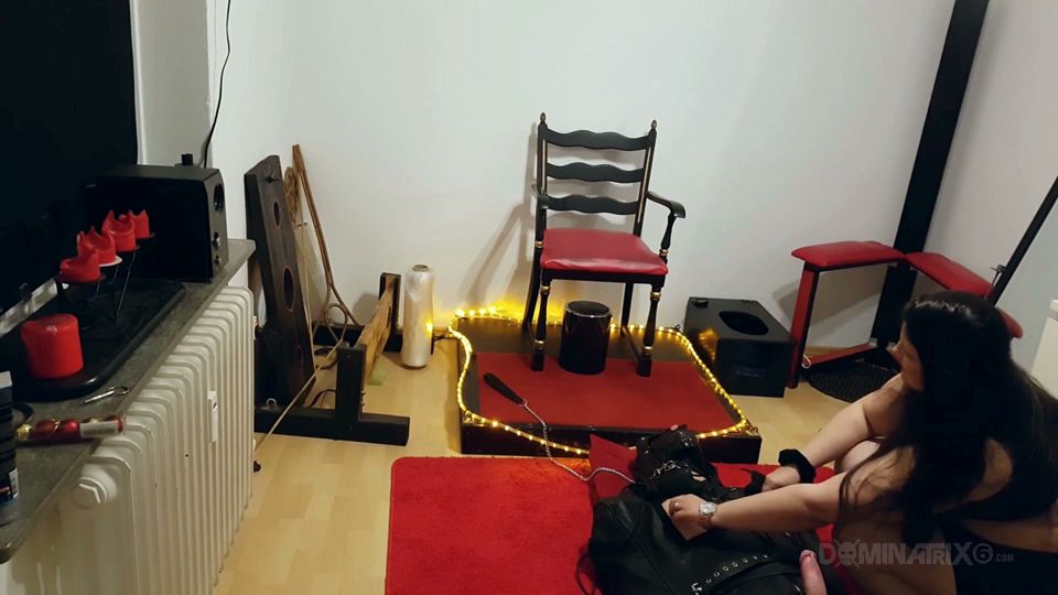 Curvy Brunette Dominatrix Commands Bound Slave in Fetish Dungeon