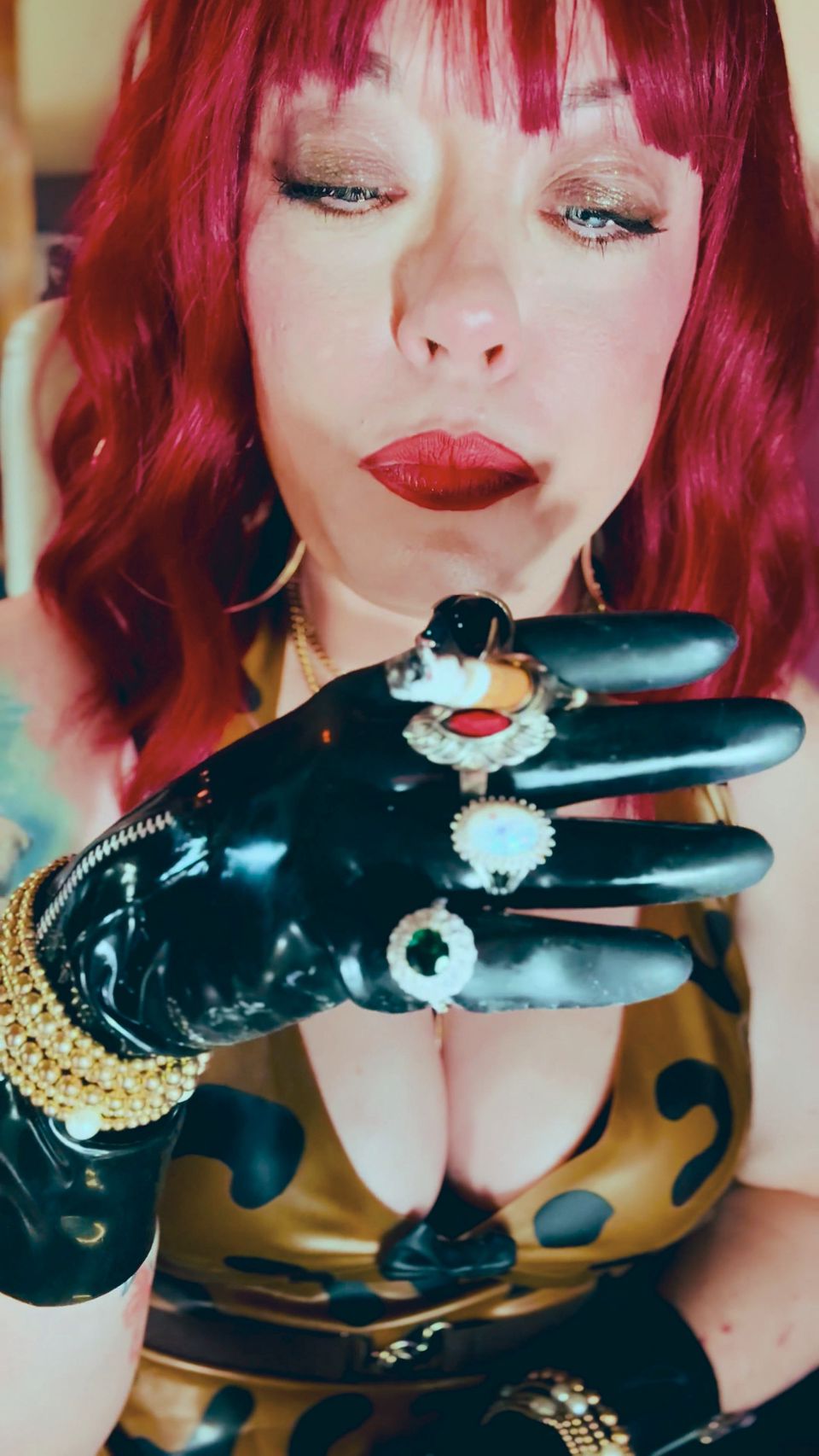 The Beautiful Rubber Beauty Tina Snua Smoking A Cigarette Using A Holder - Smoker Latex Gloves Rings Jewellery