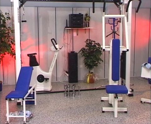 Petite blonde German babe rides two dicks in the gym
