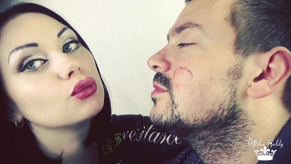 Covering Alex with red shiny lipstick kisses all over his face!