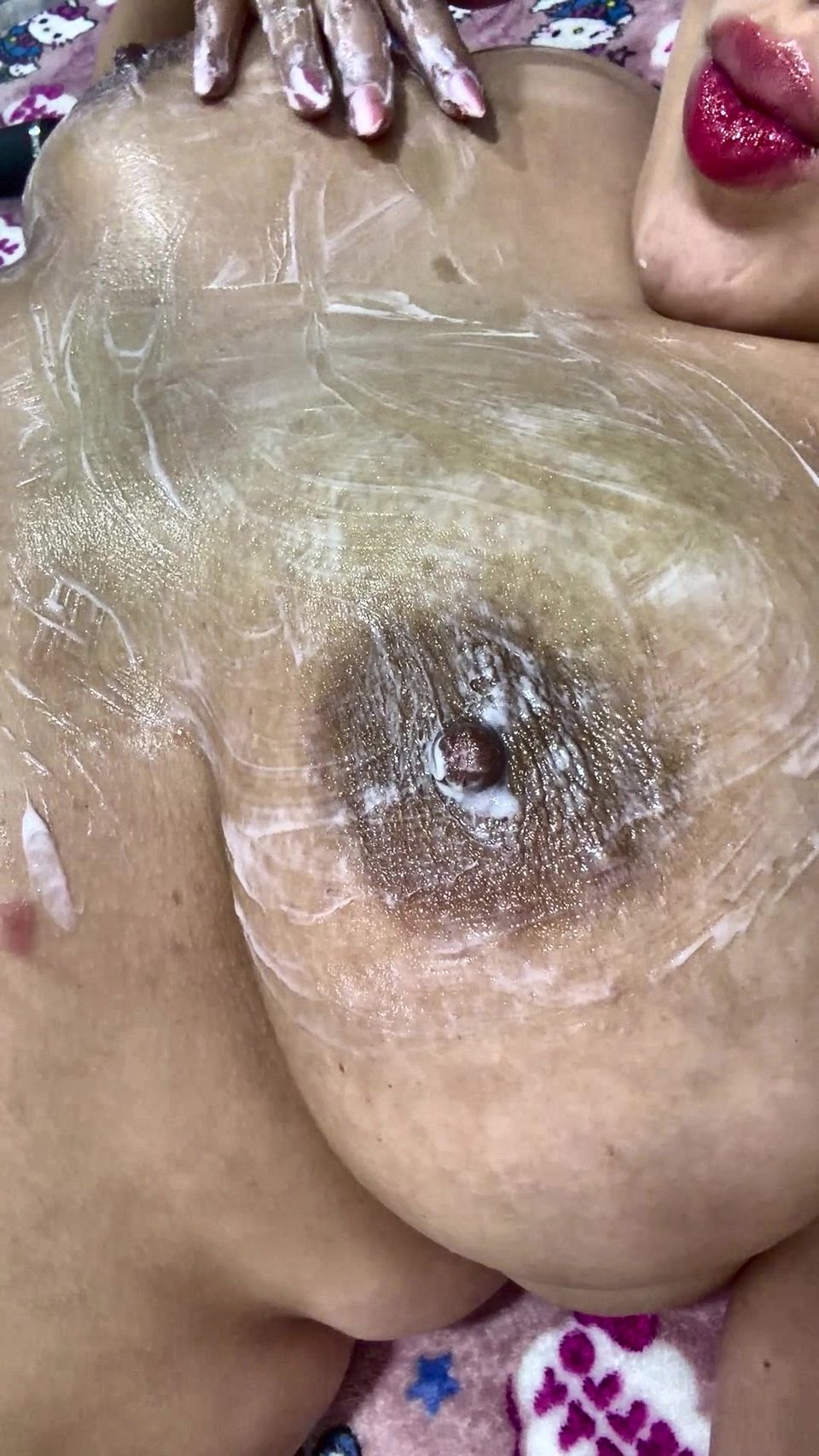 Mom massages her tits big with delicious cream