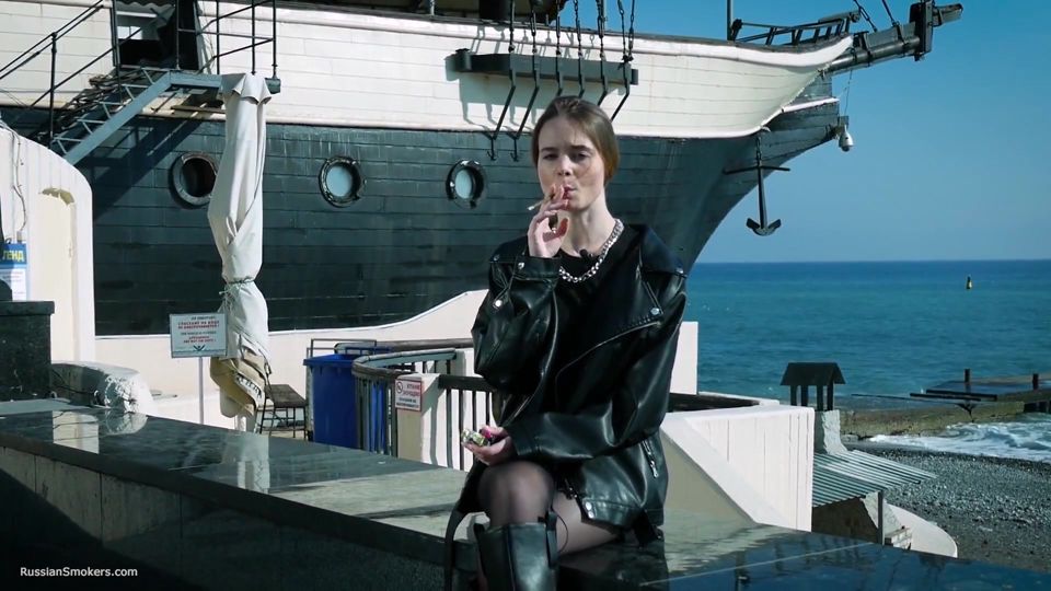 Young Russian Woman Smoking Cigarette Outdoor Terrace