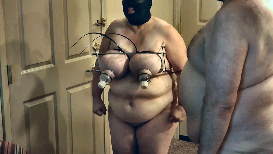 Working the slut BBW slave's tits over
