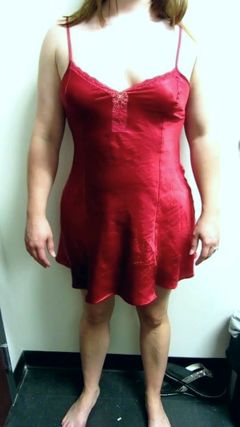 Wife posing in a red nightie