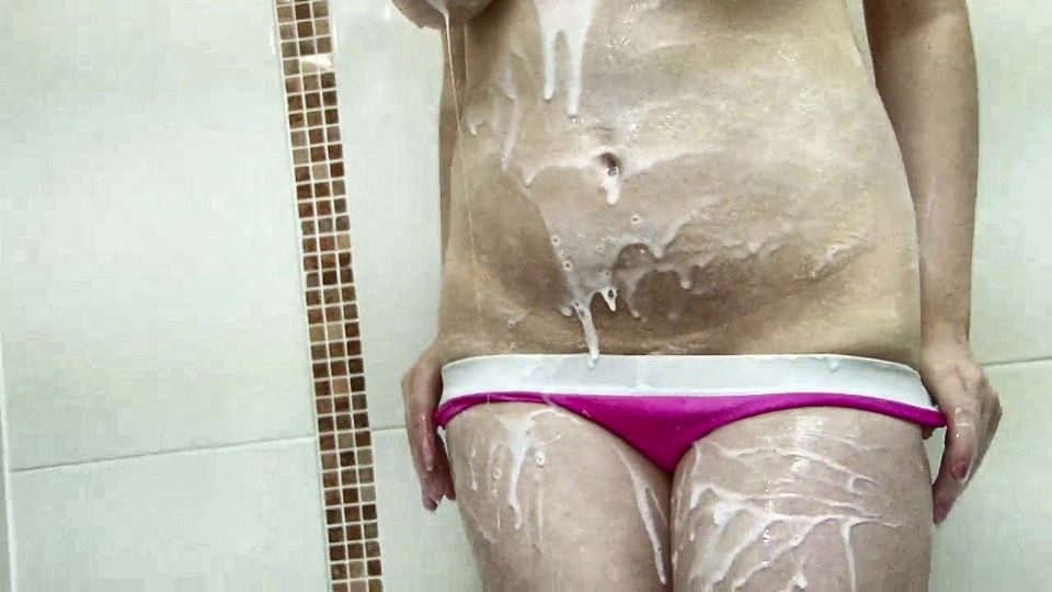 Luisa gets foamy in shower and take of bathing suit