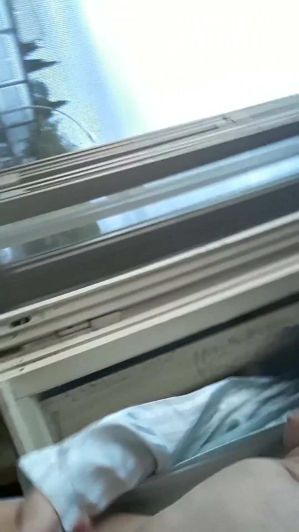 Naked in Front of the Window on a Chair