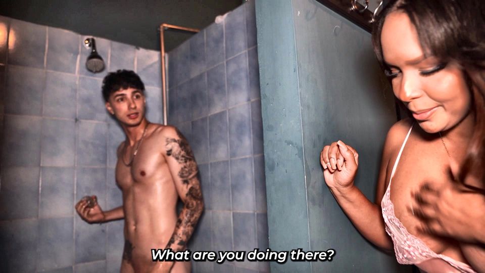 Stepmother catches stepson taking a shower and is surprised by his huge cock