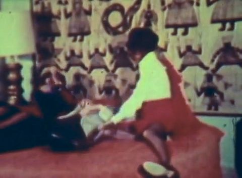 Red-tinted Vintage Loop Captures Retro Foursome in Raw Action