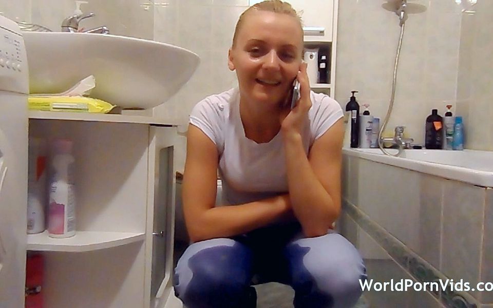A Teen Chick Pees in Her Pants While Phone Talking