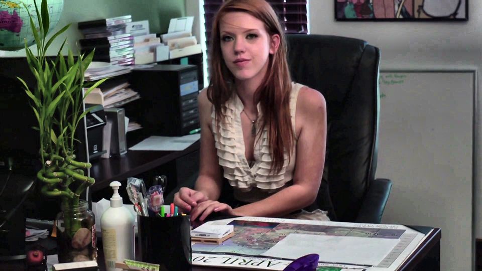 Sexy lasses kiss passionately in the office