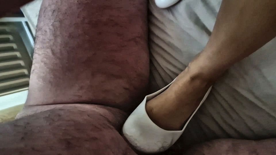 She made me polish her white patent heels, size 36, on our date