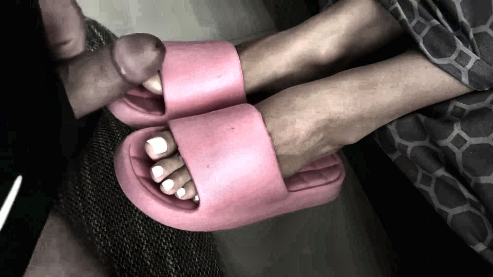Tanned Feet in Pink Flip-flops