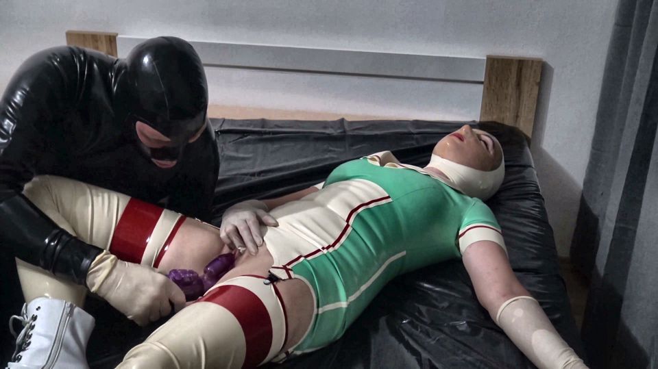 Hot Latex Nurse Got an Orgasm with a Purple Toy He Was Playing