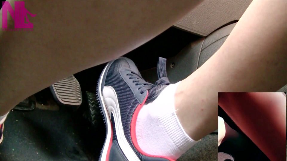 Driving in Blue Nike Sneakers and White Socks